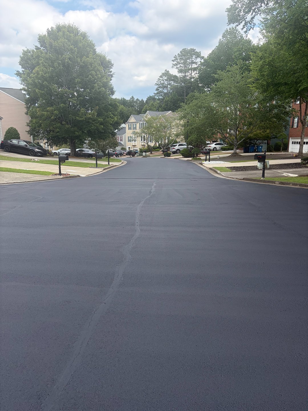 Asphalt sealcoating and crack filling 