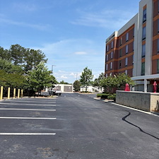 Commercial-Parking-Lot-Crack-Filling-Sealcoating-Striping-by-a-Professional-Asphalt-Contractor-Asphalt-By-Design 3