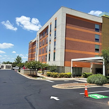 Commercial-Parking-Lot-Crack-Filling-Sealcoating-Striping-by-a-Professional-Asphalt-Contractor-Asphalt-By-Design 1