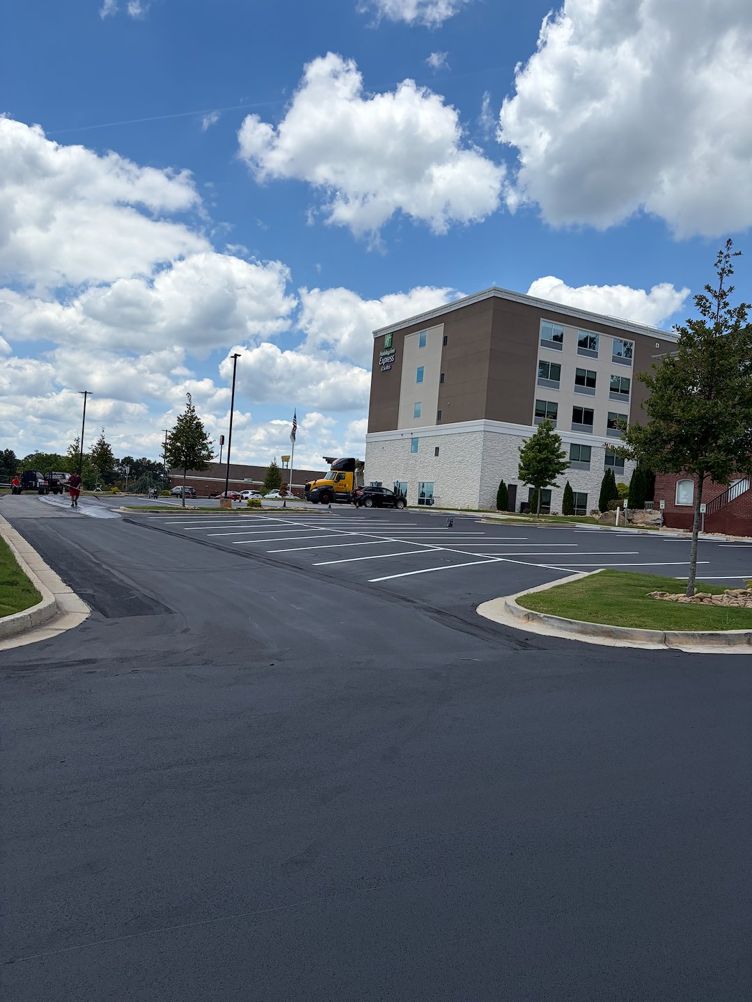 Holiday Inn Express at Eagles Landing Parking Lot Asphalt Sealcoating & Striping Project – Stockbridge, GA