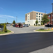 Holiday-Inn-Express-at-Eagles-Landing-Parking-Lot-Asphalt-Sealcoating-Striping-Project-Stockbridge-GA 3