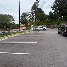 Holiday-Inn-Express-at-Eagles-Landing-Parking-Lot-Asphalt-Sealcoating-Striping-Project-Stockbridge-GA 1