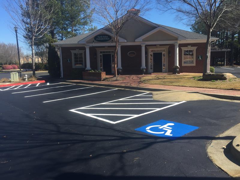 Sealcoating John's Creek Parkway in Suwannee, GA
